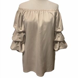 Roz & Ali off shoulder top featuring big pearl decorations on tiered sleeves
